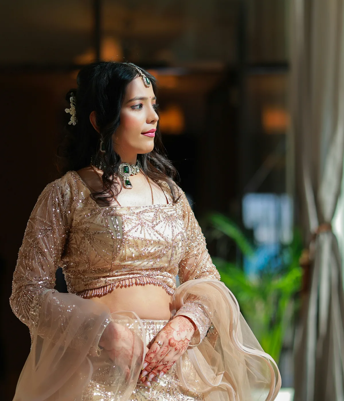 Woman wearing an elegant contemporary Indian occasion outfit