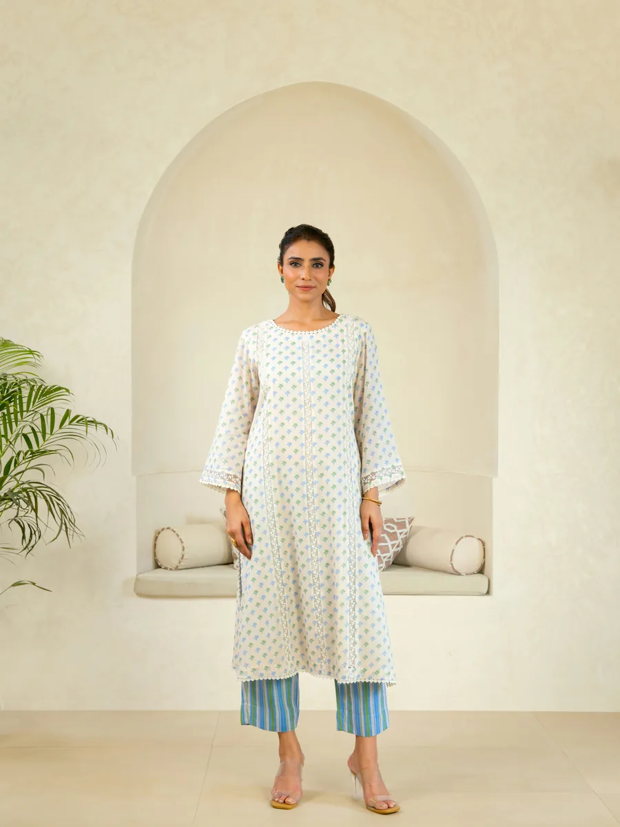Woman in a contemporary light-coloured kurta set